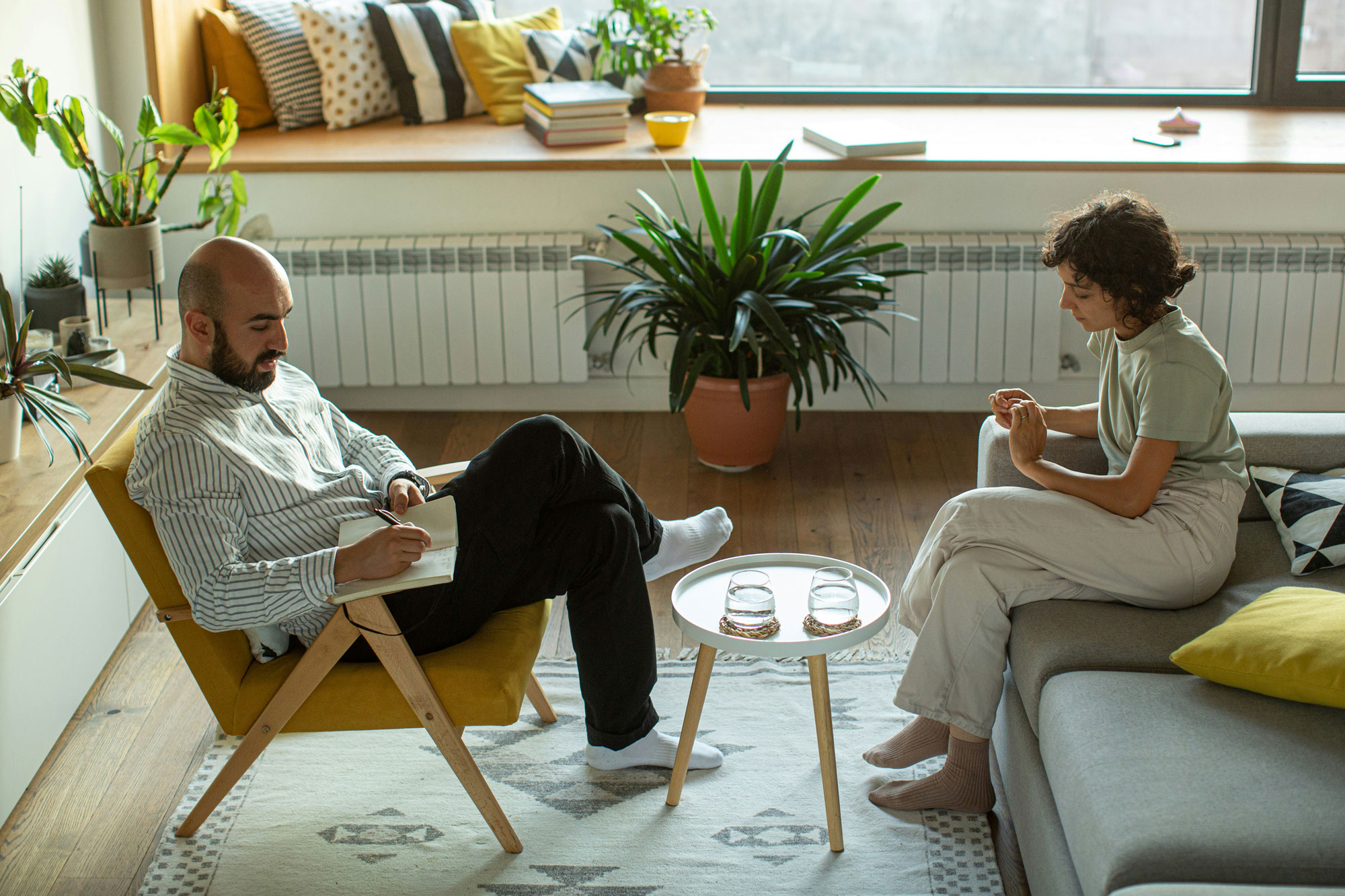therapist and client sitting across from each other