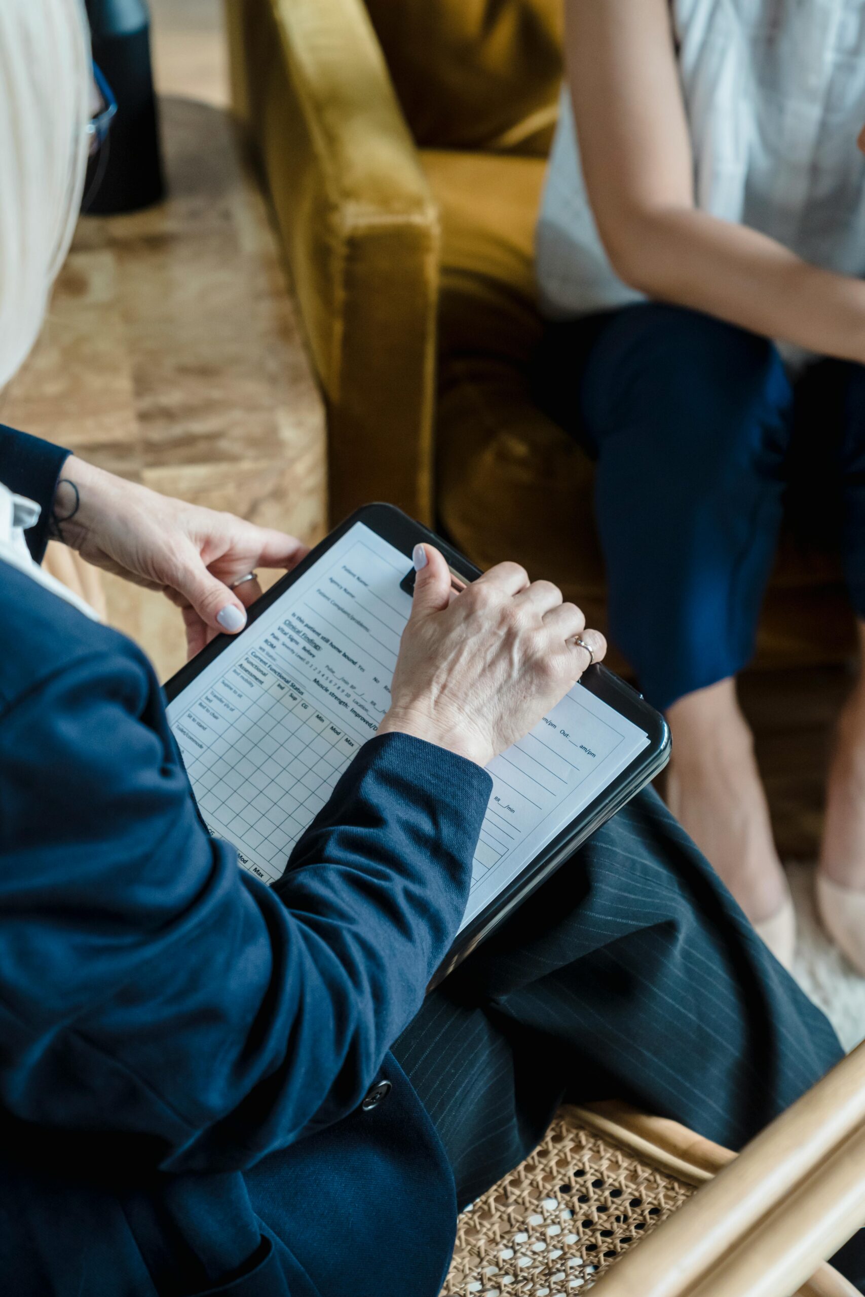 Therapist talking to client in therapy